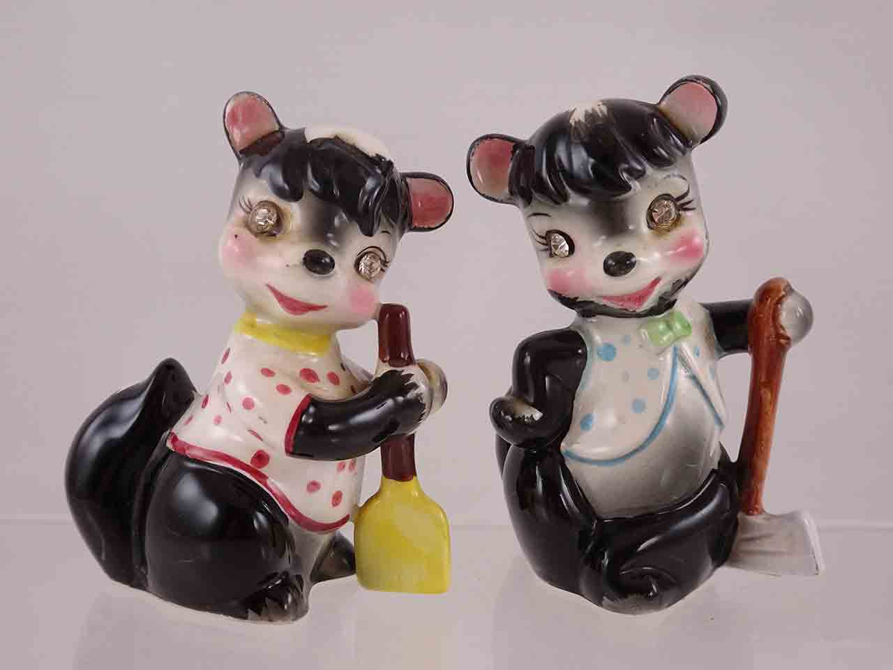 Delicate Rhinestone Eyed Animals Holding Different Items - skunks with broom and axe salt and pepper shakers