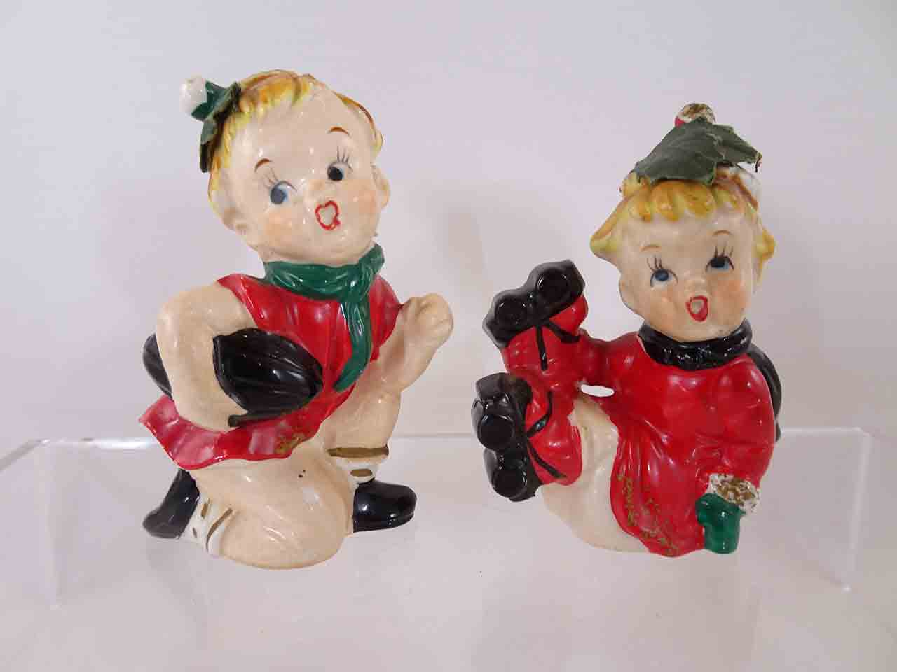Christmas children playing various sports series salt and pepper shakers