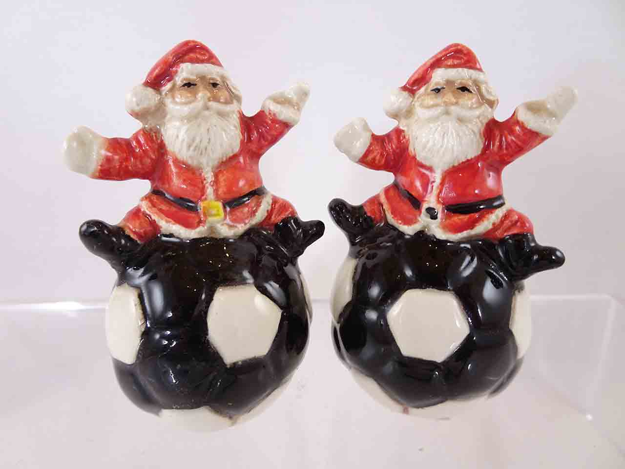 Christmas Santa Claus on soccer balls salt and pepper shakers by Linda Sexton