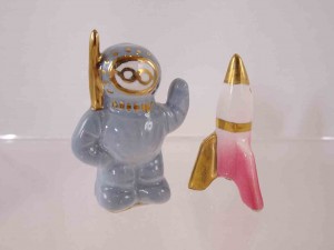 Miniature astronaut and rocket spaceship salt and pepper shakers