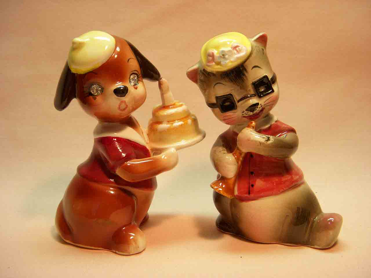 Delicate Rhinestone Eyed Animals Holding Different Items - dog and raccoon with cake and trumpet salt and pepper shakers