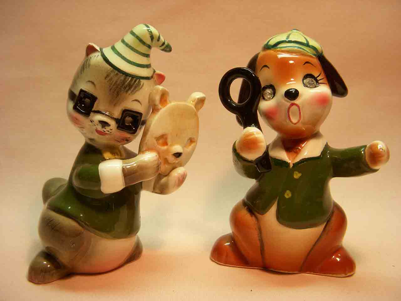 Delicate Rhinestone Eyed Animals Holding Different Items - dog and raccoon with mask and magnifying glass salt and pepper shakers